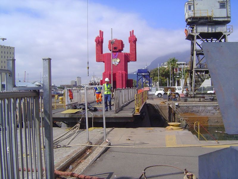 He wants to cross his fingers, but it's hard to do when you're made of plastic.