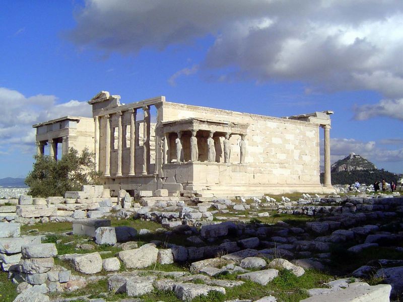 The Erechtheion was built between 421 and 407, possibly as a replacement for the Temple of Athena Polias, which stood in the foreground. A p