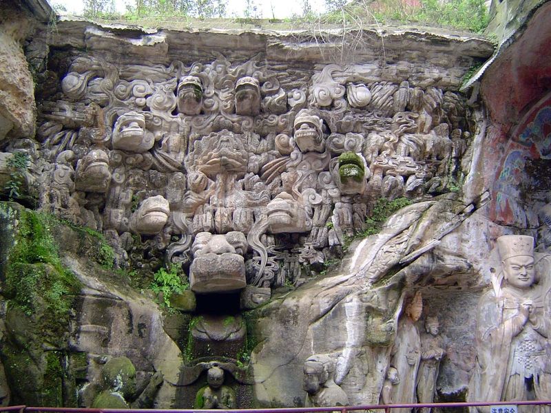 Other nagas emerge from dense vegetation.