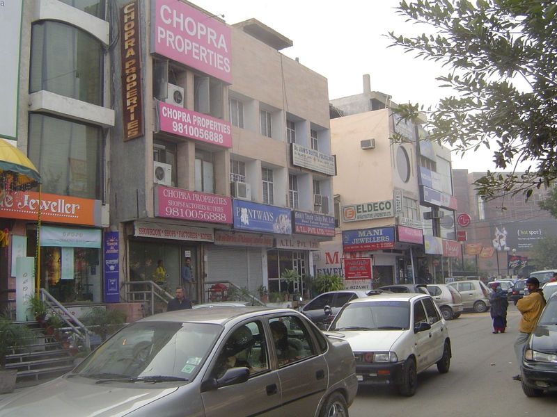 Noida already has a commercial center rich in realtors and jewellers. You can find cell phones, too, and pizza.