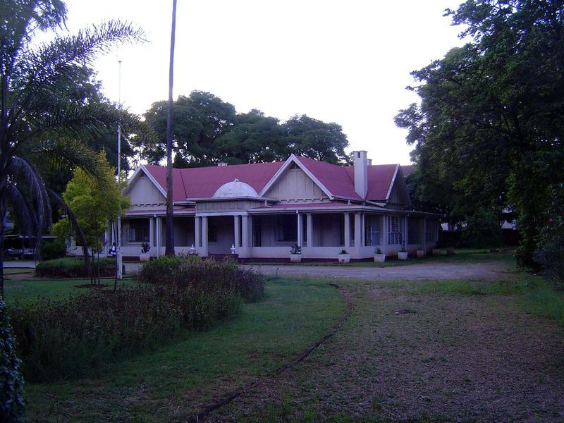 Another house, big but still with a corrugated-iron roof.