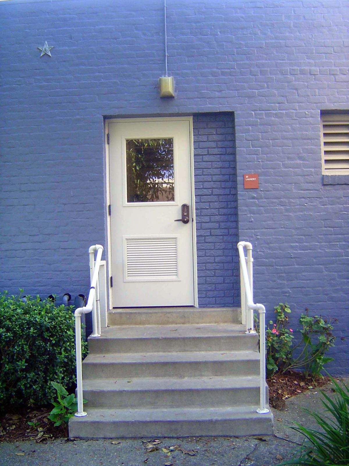 Saturday morning, the boy carried plastic hampers up these stairs to coin-operated washing machines and driers. Back then, the room was neve
