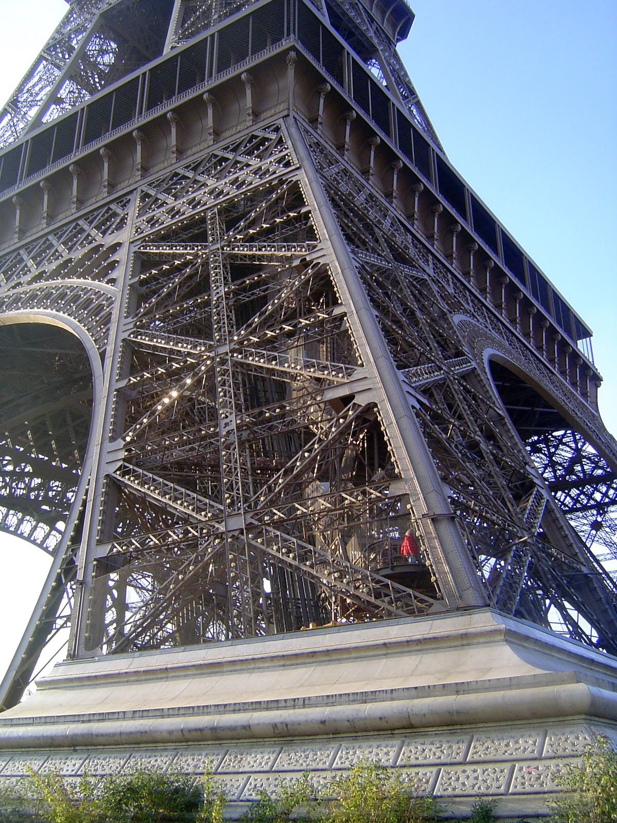 The piers are so massive that the tower's 7,000 tons put no more pressure on a square inch of ground at the base than the leg of a chair doe