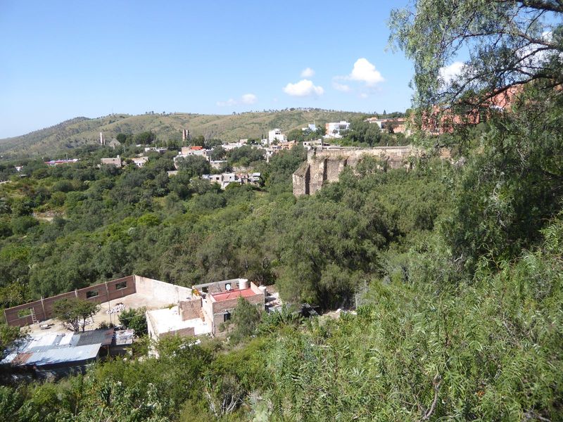 Obrag n built a house for himself near this vantage point, which looks over to the El Tiro shaft in the distance. You can make out twin stac
