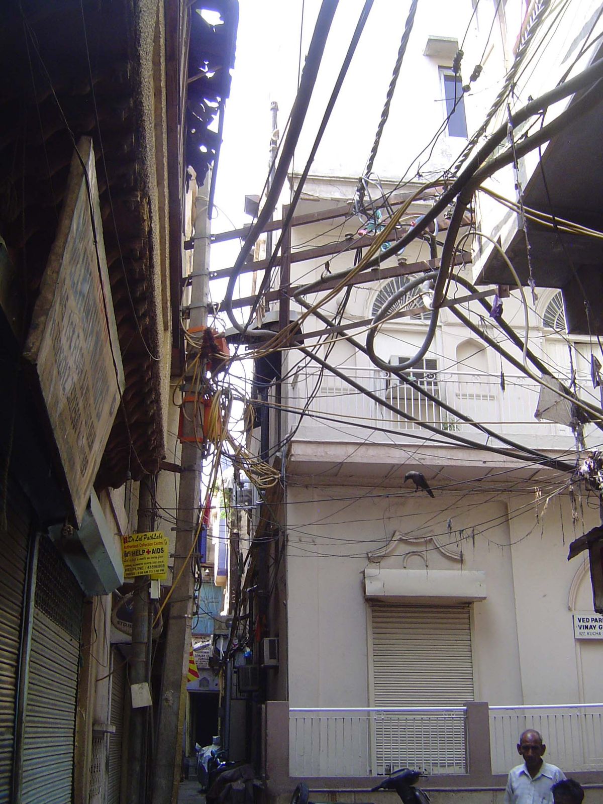 Is it an alley or a powerline conduit with pedestrian access?
