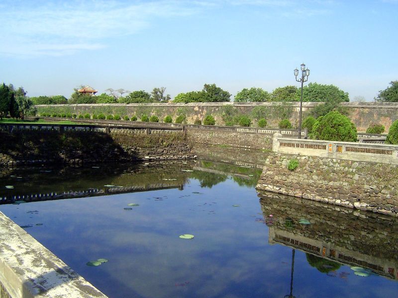 The citadel moat, with a bit of another gate peeping over the trees.