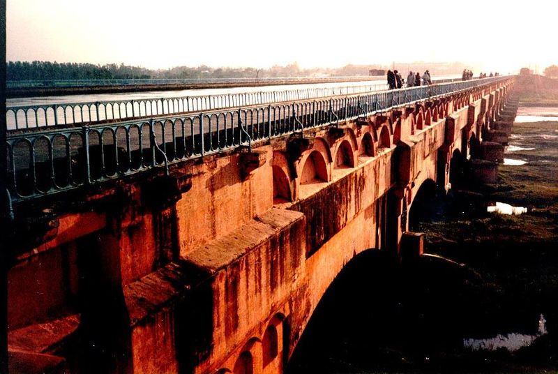It's the Solani Aqueduct. Millions and millions of locally made bricks support the canal as it crosses the wide valley of the Solani.