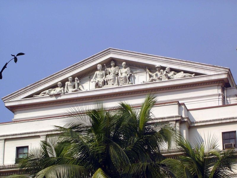 The classic form but with Filipinos in the pediment.