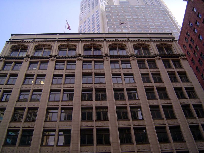 The building has lost its cornice.
