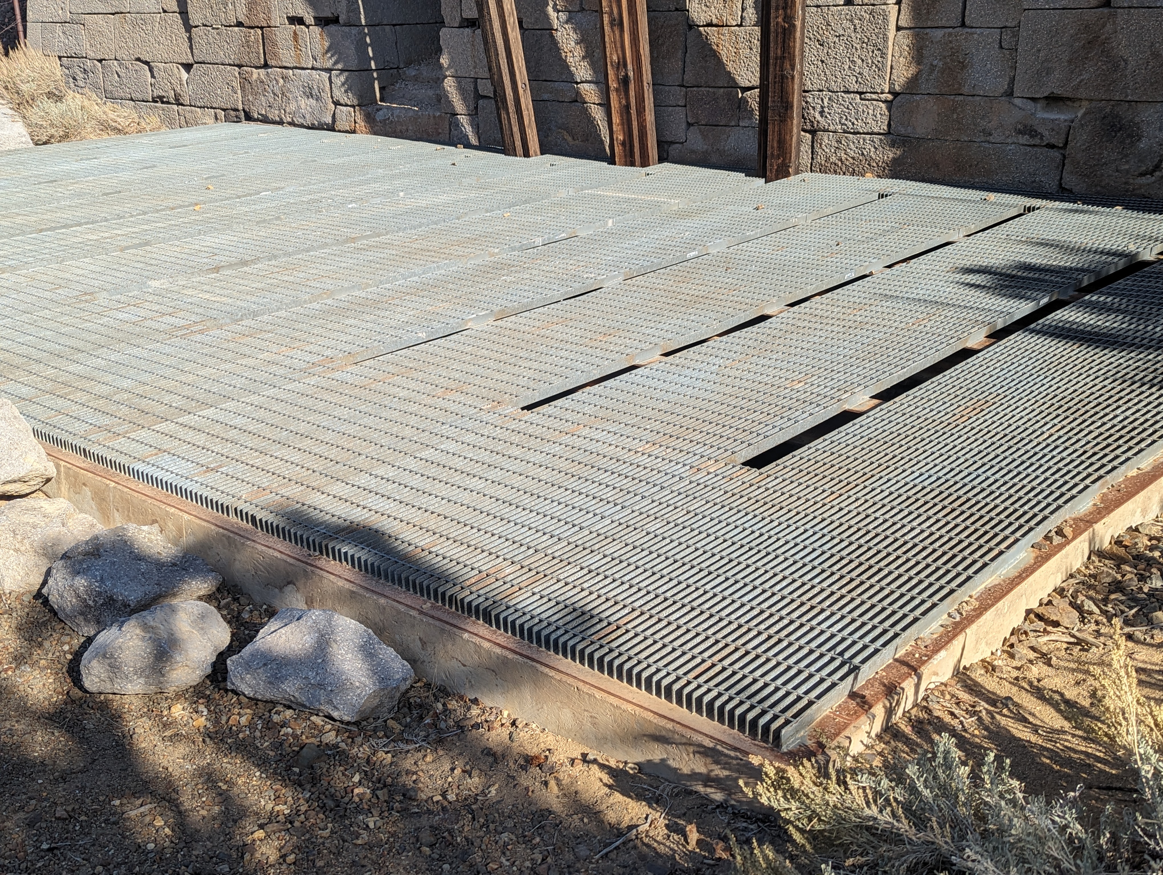 Somebody has thoughtfully provided a grating so we don't fall down the hole.