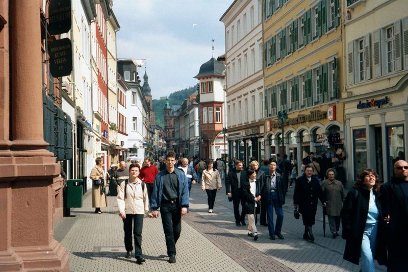 Lots and lots of pedestrians walk the Hauptstrasse.