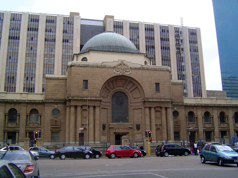A couple of blocks to the northeast is the supreme court, with a cornerstone from 1910 and a design by the public works department.