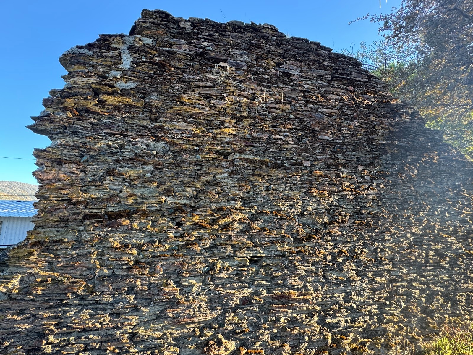 I don't know when brick became common here, but until then schist was the material of choice, unless you didn't mind if fire took your prope