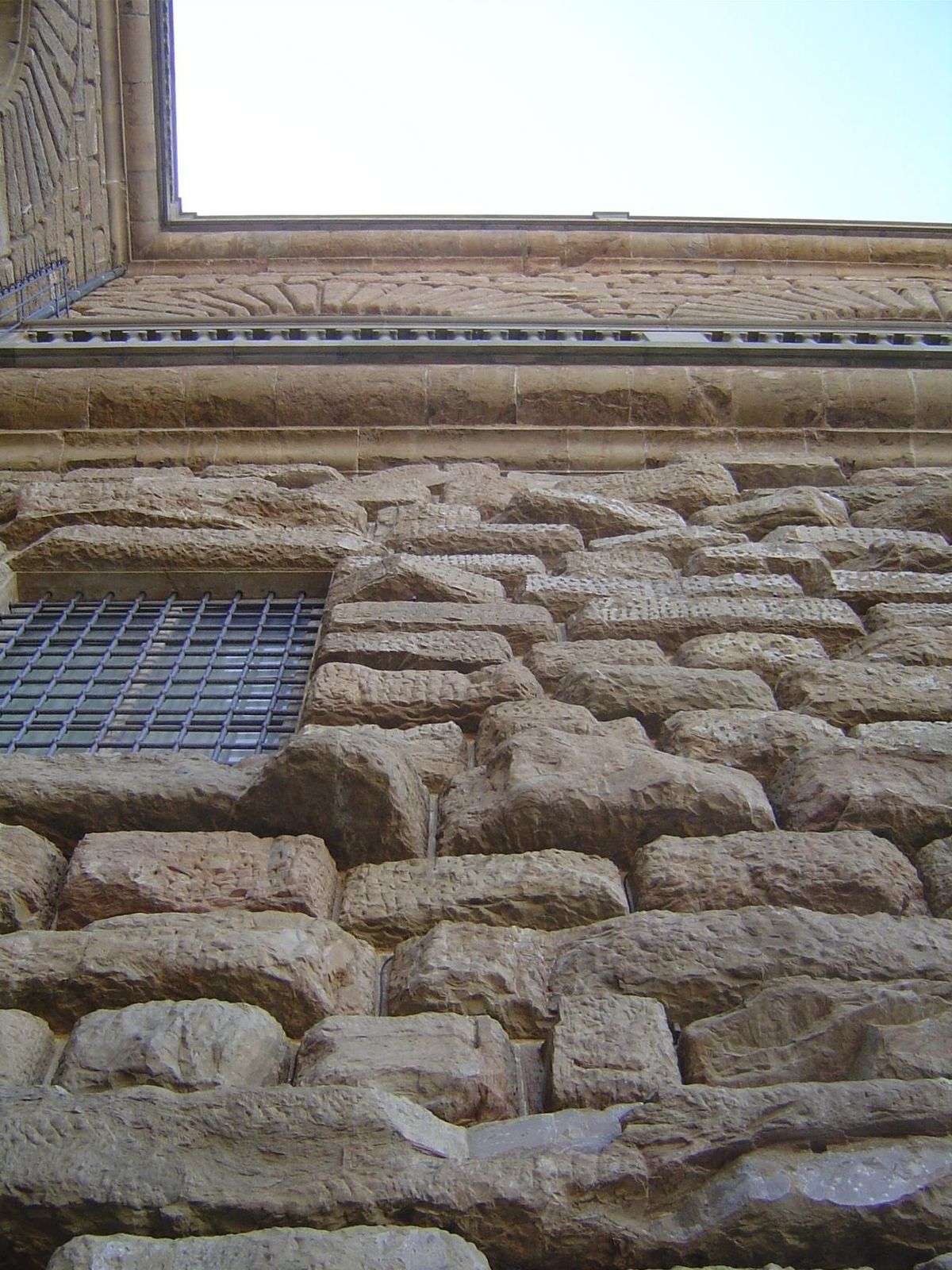 Another view of the same wall, showing the smoother texture of the upper floor.