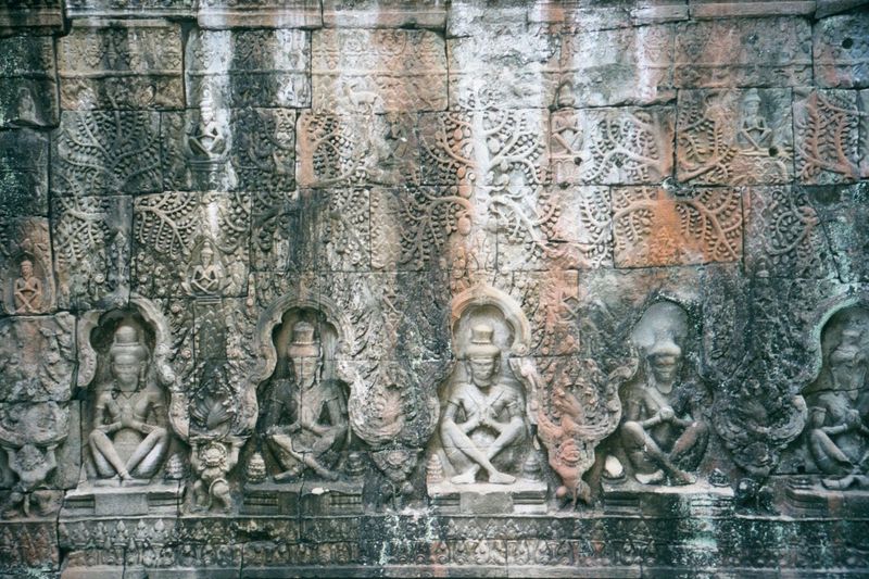 A nearby line of Buddhas was recarved during the Hindu interregnum into a line of prayerful hermits or rishis.