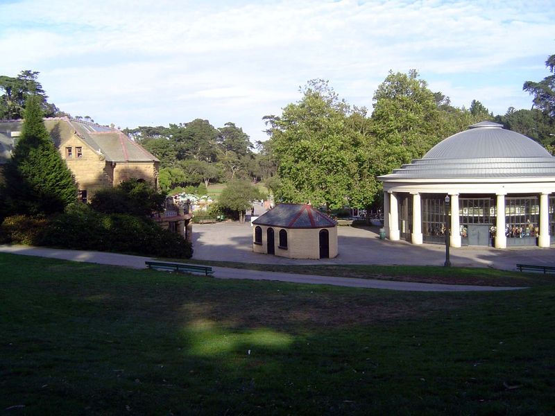 Here's the playground the boy knew. The small building sold tickets for the merry-go-round, which ran every day, or so it seems in memory.