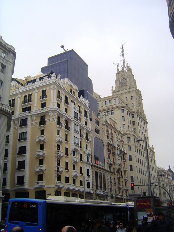 Goitia complains of the "banal eclecticism of the kind that triumphed, for instance, in the Gran Via... \where the pressure of economic inte