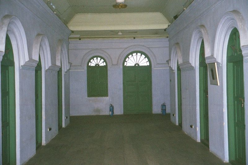 The view the other way, into the upstairs hallways.

Syed Alatas was a Sumatran trader who smuggled guns to his fellow Acehnese to help them