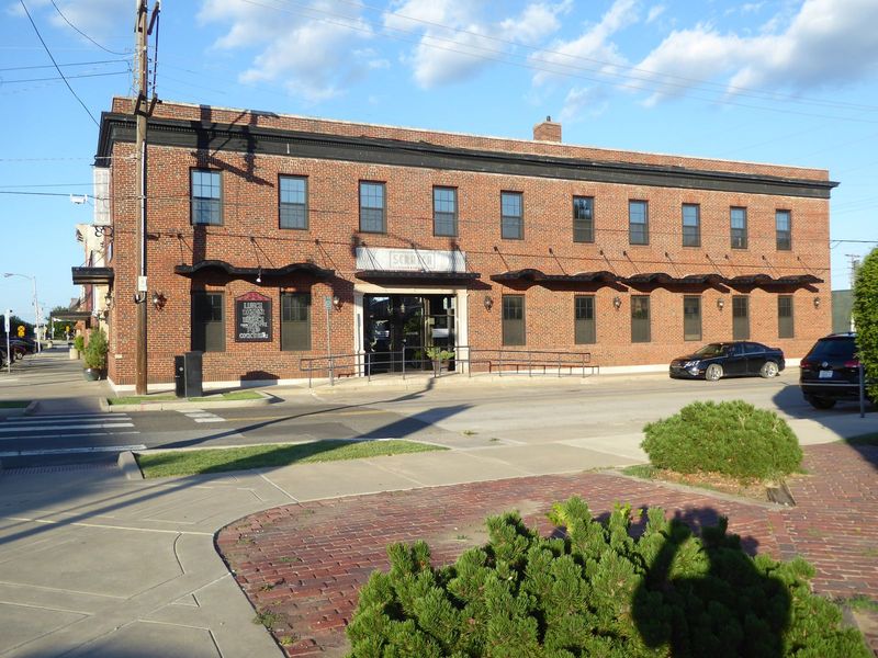 The old telephone company building has been restored with apartments upstairs and a pricey restaurant below.