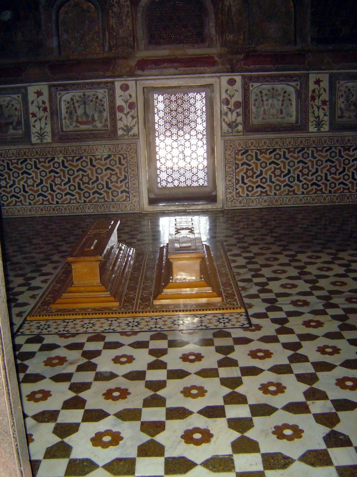 There are several tombs in the building. The two here at the center are of Mirza Ghiyar and his wife, Asmat Begum. Her cenotaph, though slig