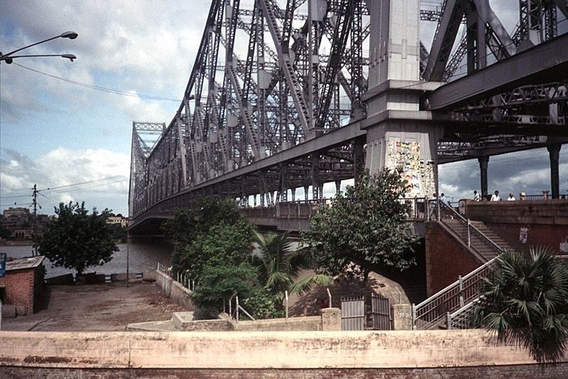 Jump a mile upstream to the great Howra or Haora Bridge, with a 1,500-feet span including the two cantilevered arms and the central suspende