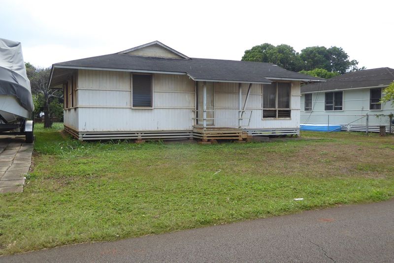 Like lots of postwar suburbs, the homes were all the same when new, but many have been modified over the years. Here's one unchanged.