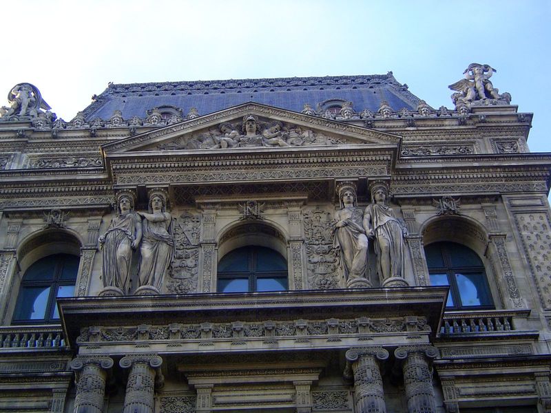 Lefuel created the pavilions seen in the Cour Napoleon. He kept Le Mercier's poor caryatids but "encrusted his facades with luxuriant sculpt