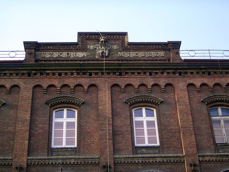 The words say Urban School, 1886. The school is in Kazimierz, the old Jewish Ghetto.