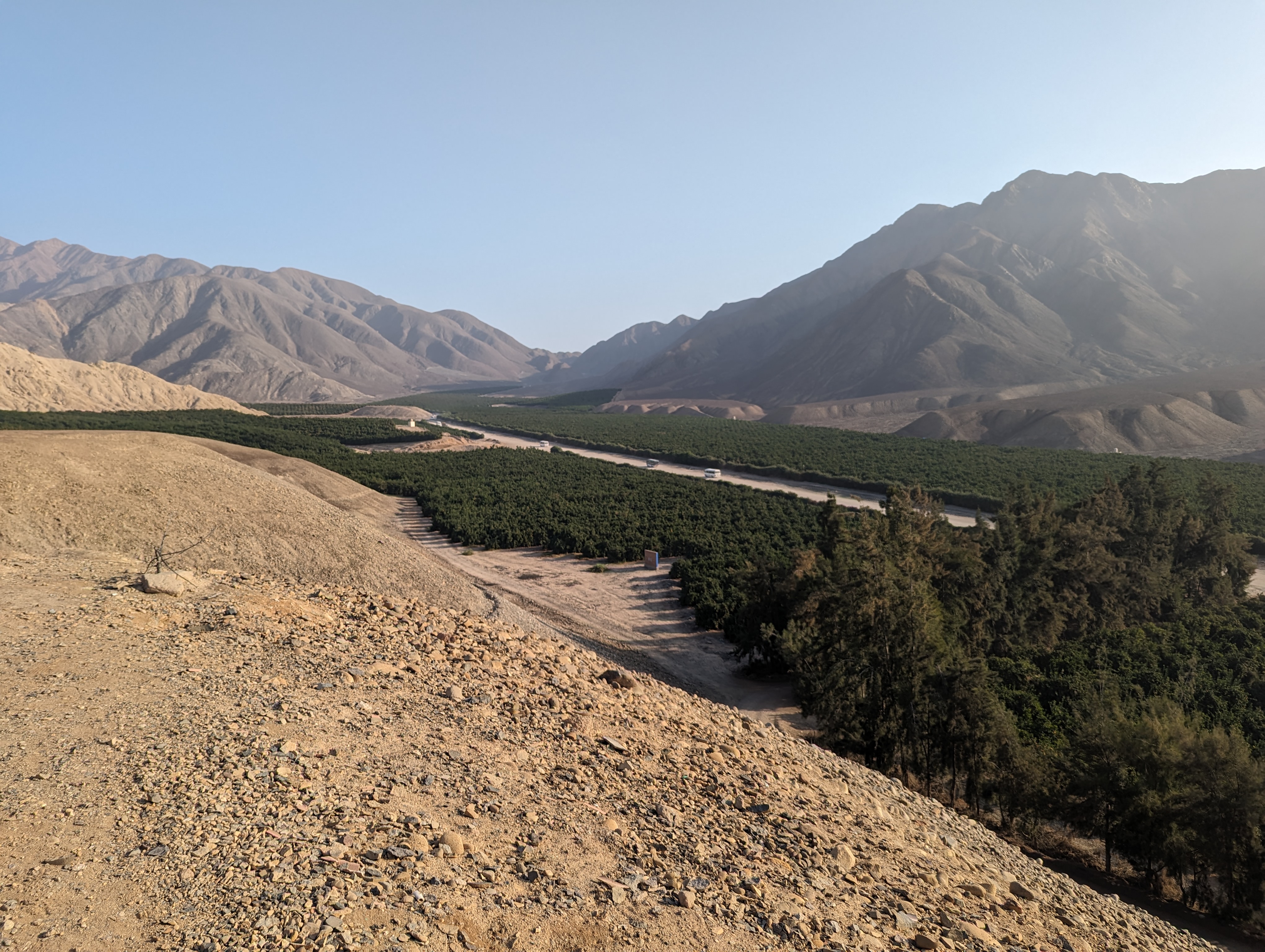 The valley floor is cultivated, planted in this case with mandarins belonging Angelo Pinasco's Agroindustrial Company La Punta.