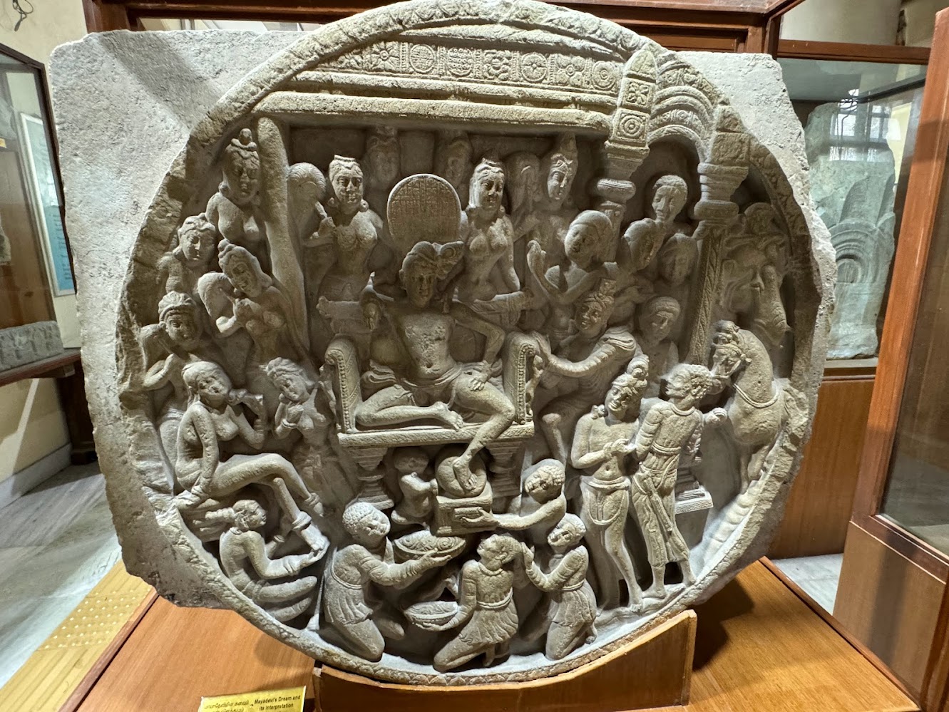 Accession 17, shows King Bandhuma seated with his two daughters one seated at the far left, the other standing at his right hand.  It's a st
