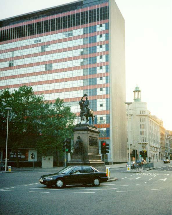 Notice anything weird? There's Prince Albert waving, and behind him is The Daily Mirror Building of 1961. Designed by Sir Owen Williams, it 