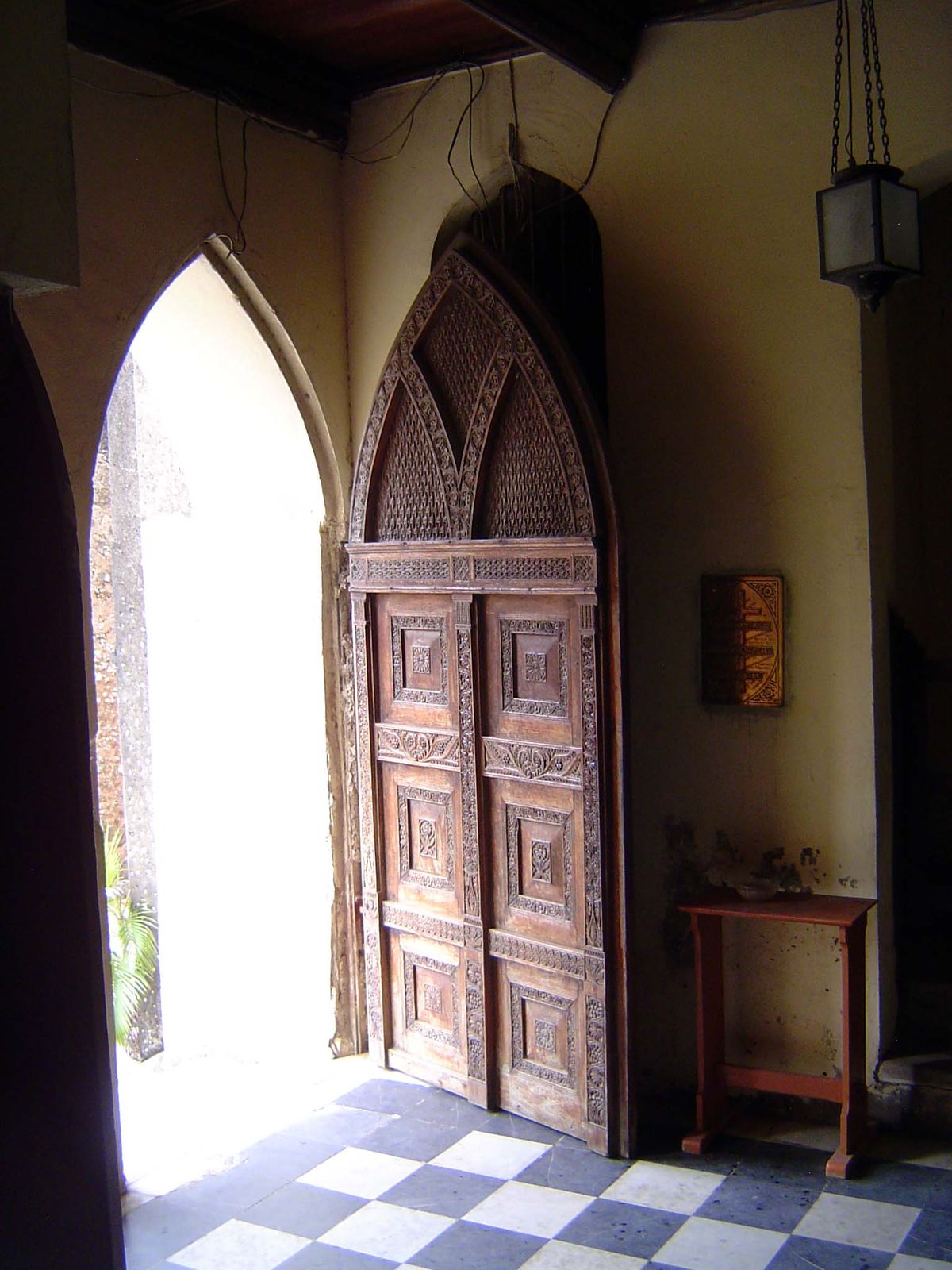 The entry has a typical Zanzibari door, though nodding to the Gothic. The true Omani door would have a flat lintel.
