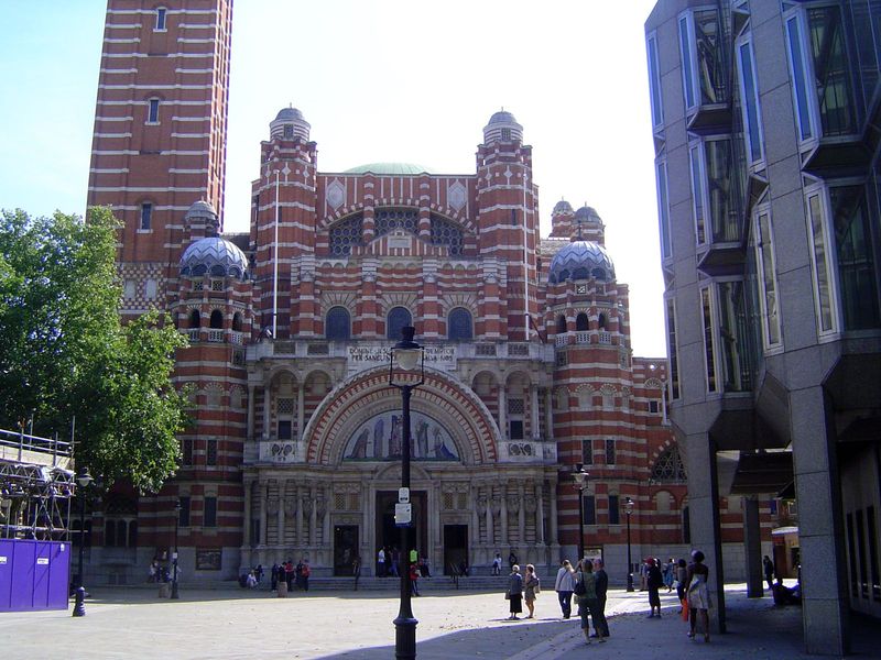 The base is granite, above which red brick is laced with bands of Portland stone, a limestone from Dorset. The domes are concrete, the coppe