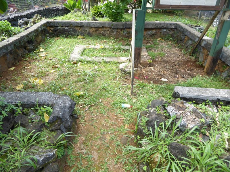 The walls are a post-independence addition by Boy Scouts. It's odd that there's no stone or brass inscription, but most islanders, locked in