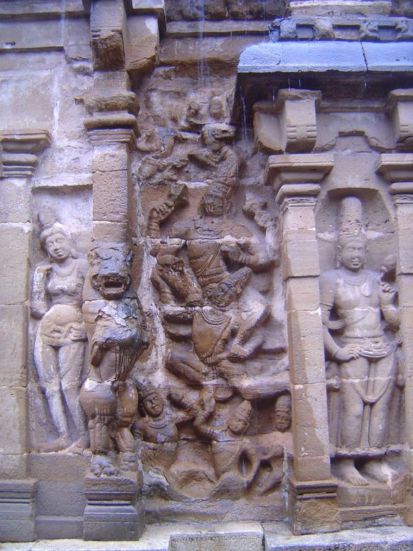 The central figure is Garuda, whose bent legs like Surya's, a couple of images back indicate flight. He is carrying Hari, whose name indicat