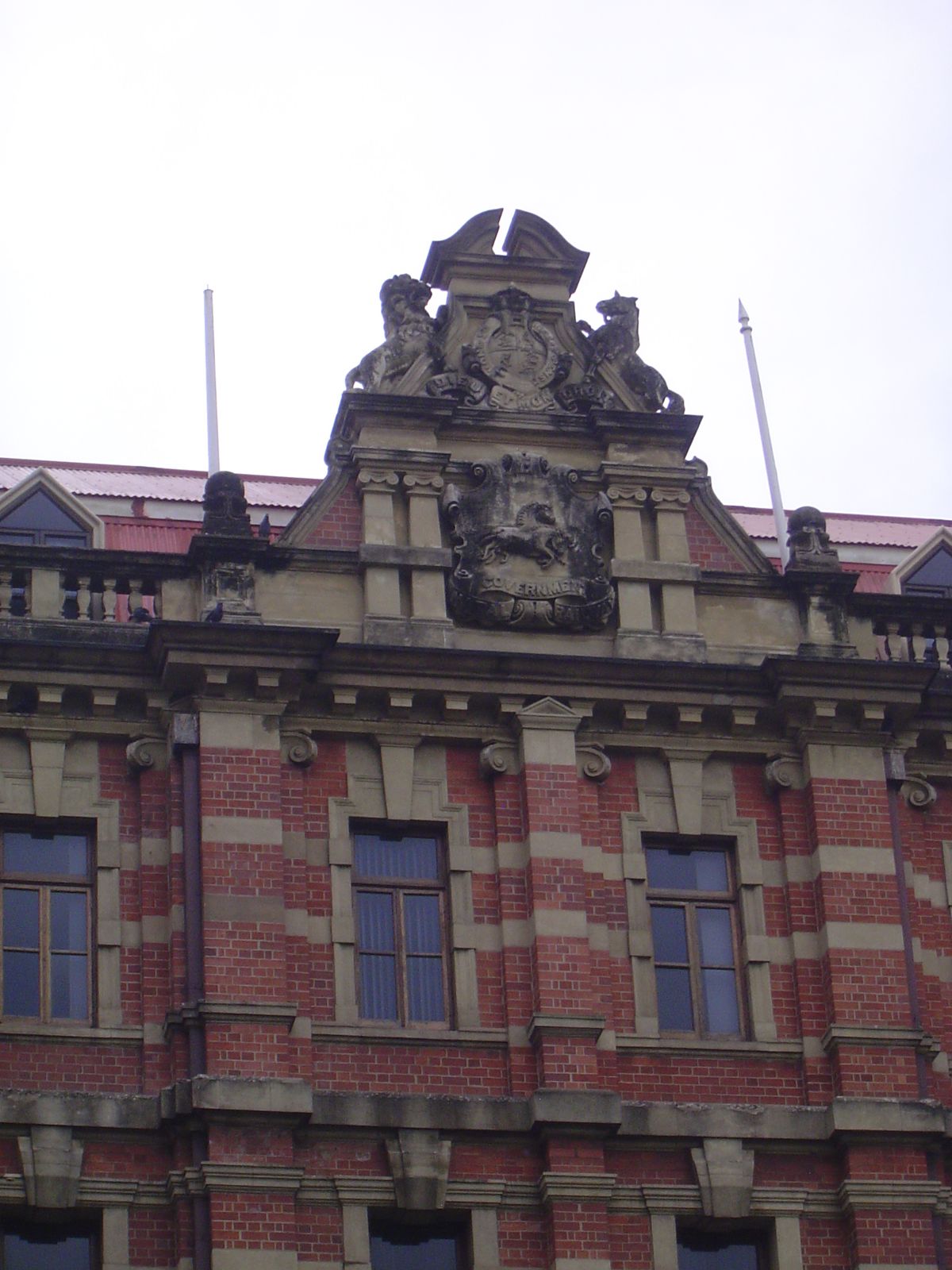 The British royal arms are up top; just below them is the Natal version, with two galloping wildebeest.