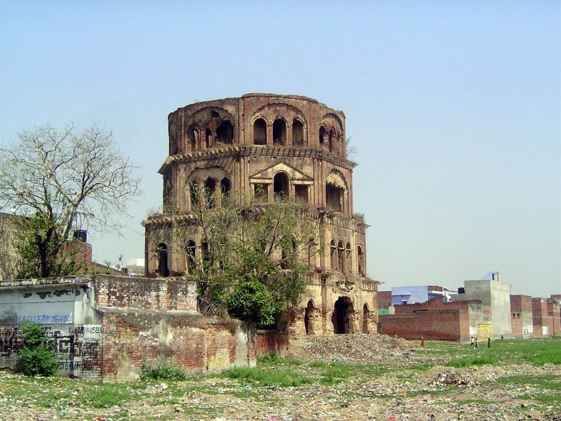 A watchtower, the Sat Khande, intended to rise seven stories, but abandoned at the death of Muhammad Ali Shah.