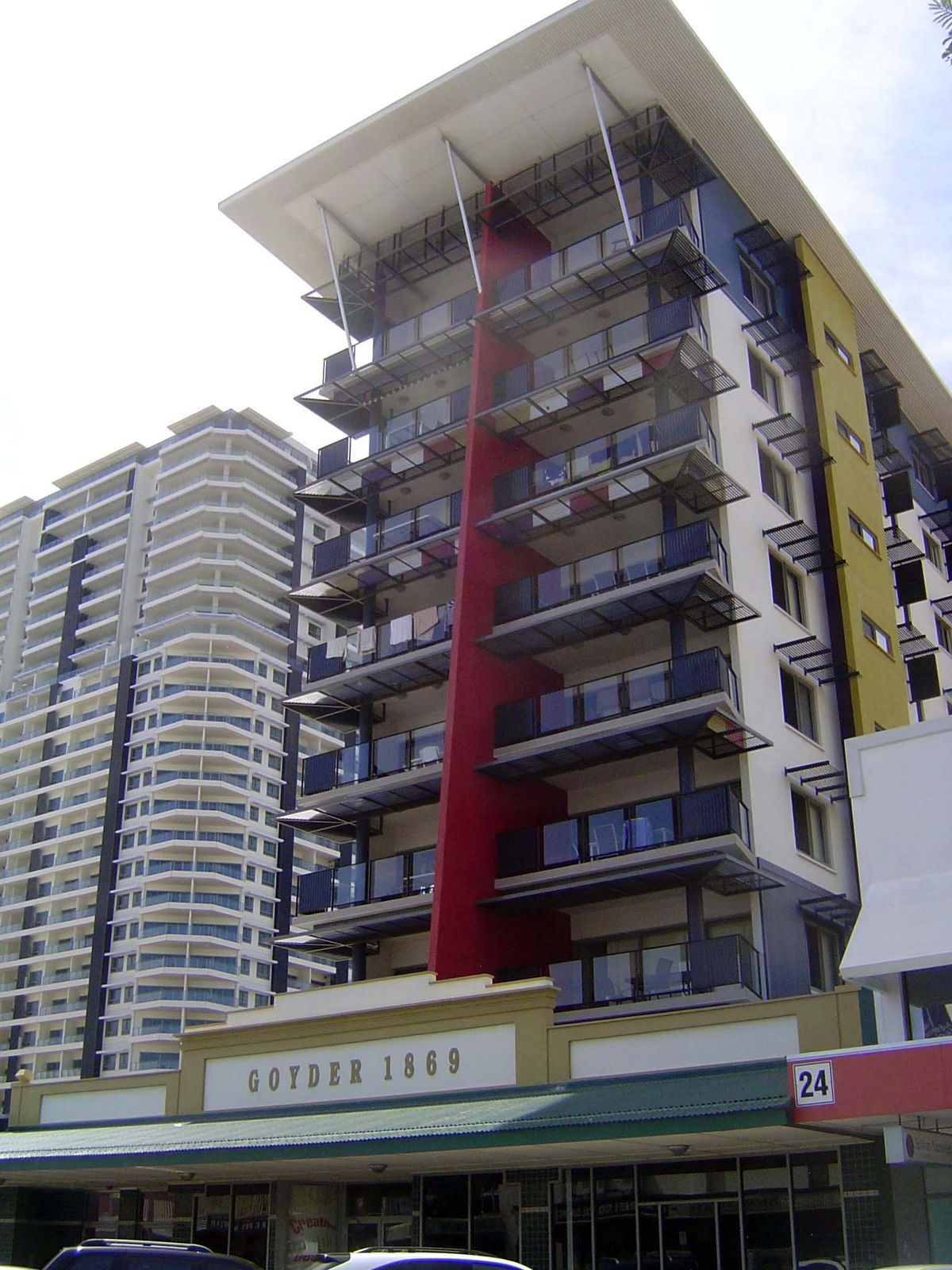 There are many residential high rises, this one boasting a bit of preserved facade.