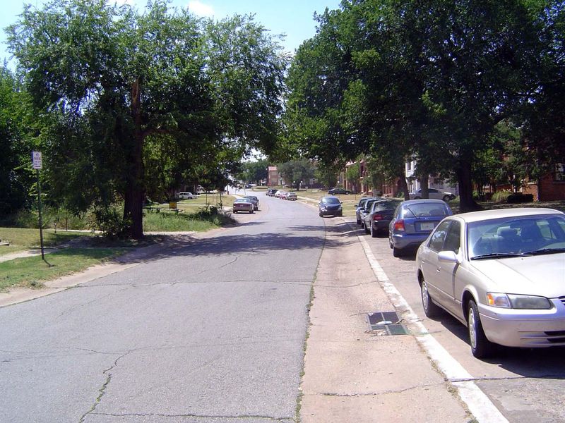 East Street curves uphill from the parkway toward the Lincoln Terrace Addition, laid out by John Culbertson, the developer who gave the land