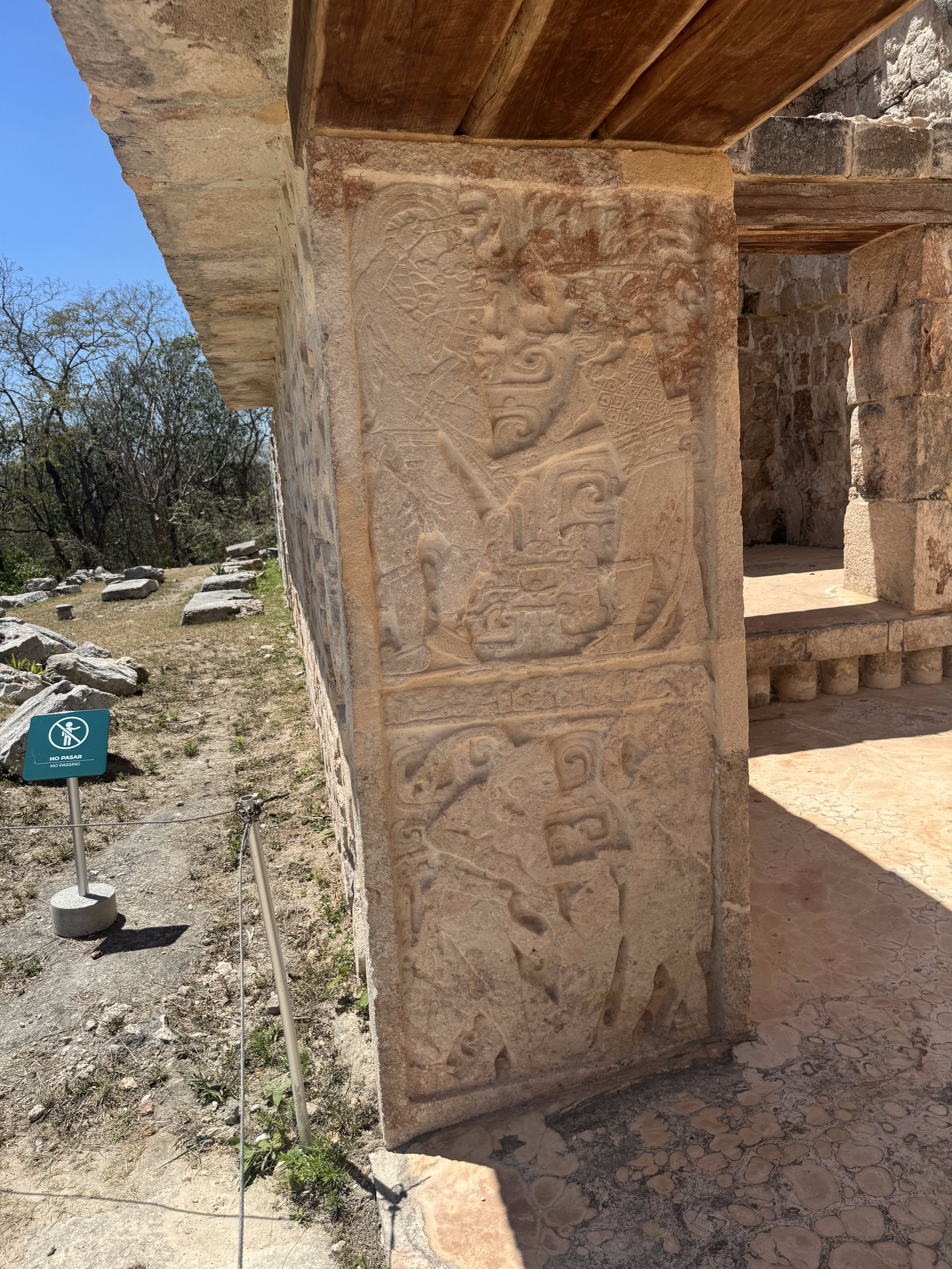 On a door jamb of the palace, warriors take captives.