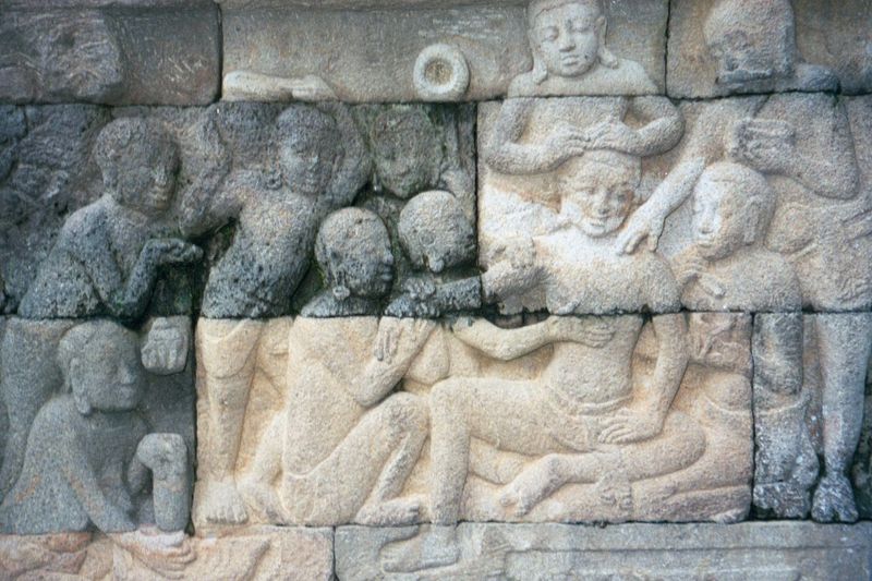 This, on the right, seems to show a woman being cared for.