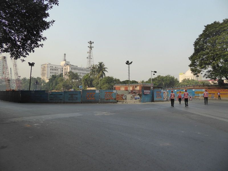 The main facade of the Writers' Building overlooks these trees, which encircle the pond at the center of BBD Bagh, until 1954 Dalhousie Squa