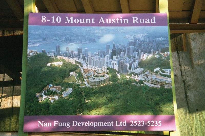 The atmosphere is crystalline in this developer's sign for a property very close to the summit of Victoria Peak.
