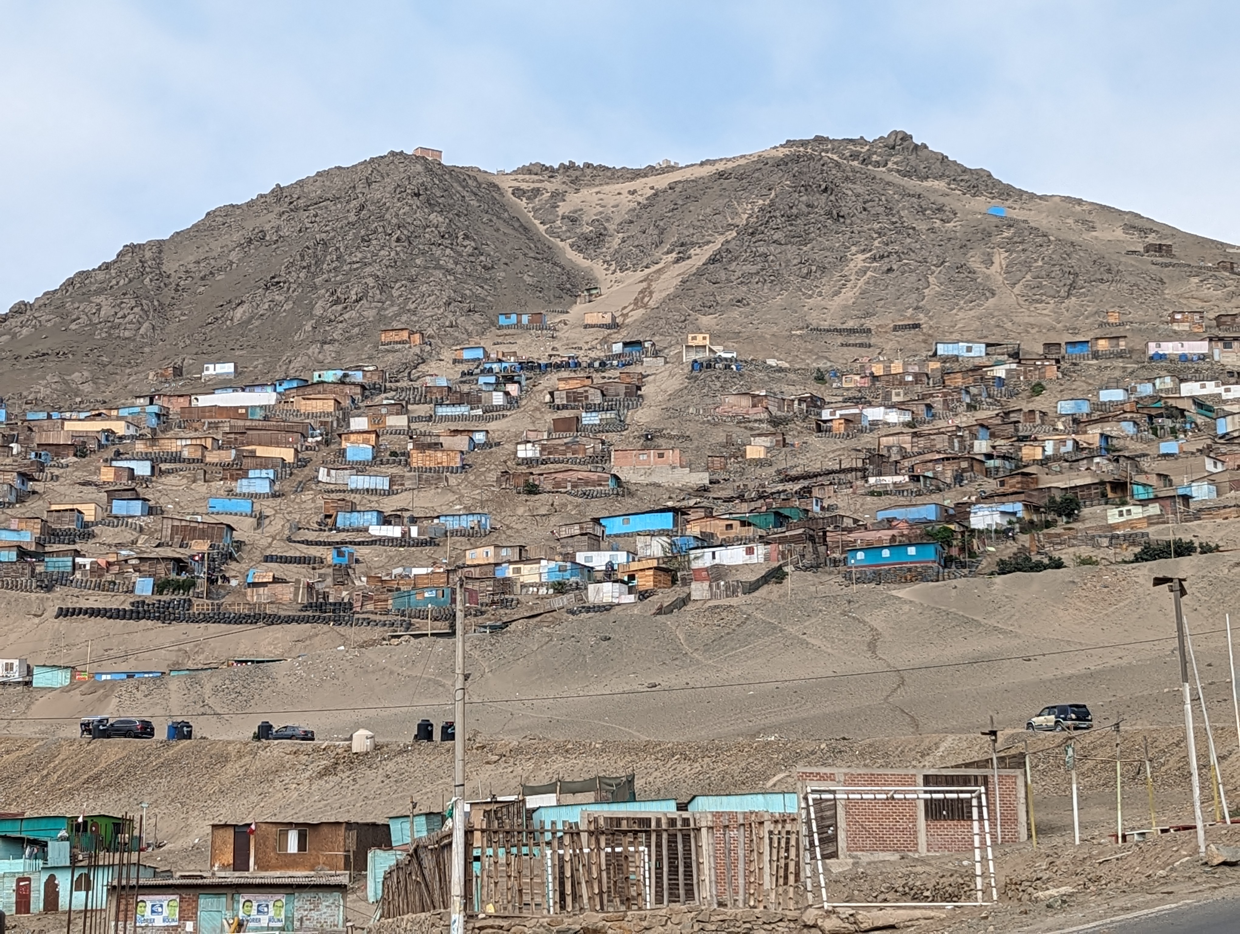 Farther north, informal housing whose owners hope there's never a heavy rain.