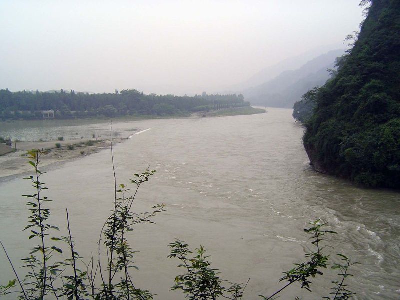 Here's the river at the head of the diversion, which flows to the right. The forested far side is an island, and the flow on its far side is
