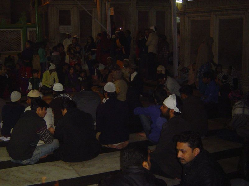 At night, the courtyard fills with musicians at the center.