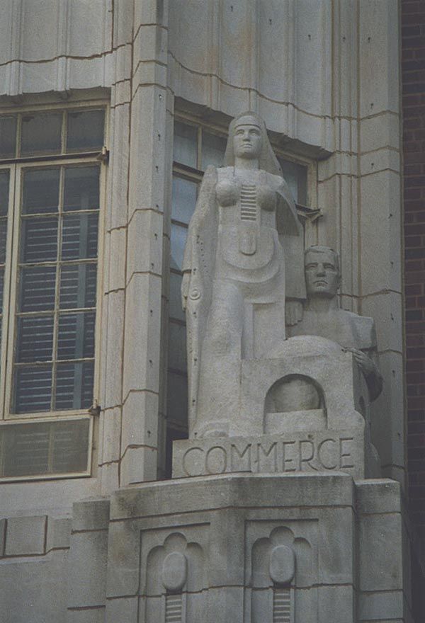 Lady Commerce, who flanks Dame Industry, seems even more intimidating than her sister, but you have to admire the way she keeps her guy on h