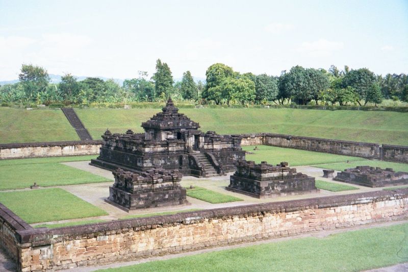 Two miles west of Prambanan, this is Candi Sanbisari, another Hindu temple. It was only discovered in 1966, when a bit of it was accidentall