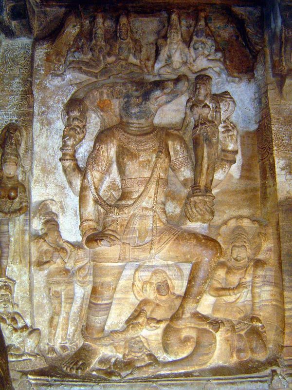 Varaha, the boar-headed avatar of Vishnu, tramples on a serpent and holds in his hand the earth goddess Bhumidevi, whom he has just rescued 