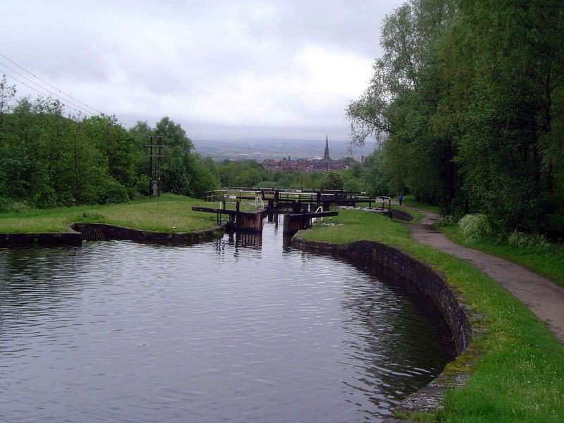 Bump, bump, bump, down the hill: that's Wigan in the distance, with the spire.